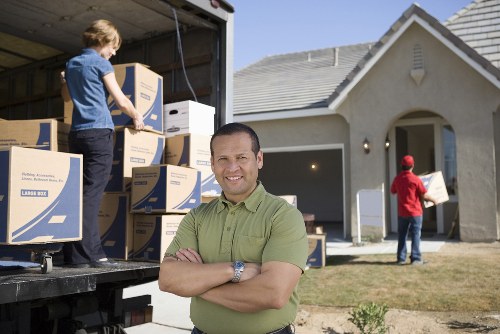 Packed office boxes and workstations prepared for a commercial move