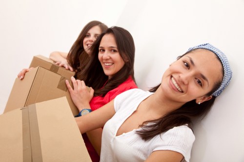 Unpacking household essentials after a move in Colliers Wood