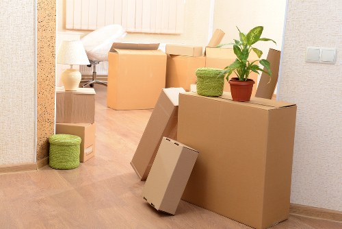 Organised packing materials and labelled boxes for moving day