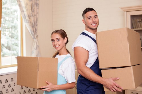 Packed boxes and furniture ready for storage in Colliers Wood
