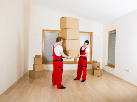 Careful furniture loading into a removal van in Colliers Wood